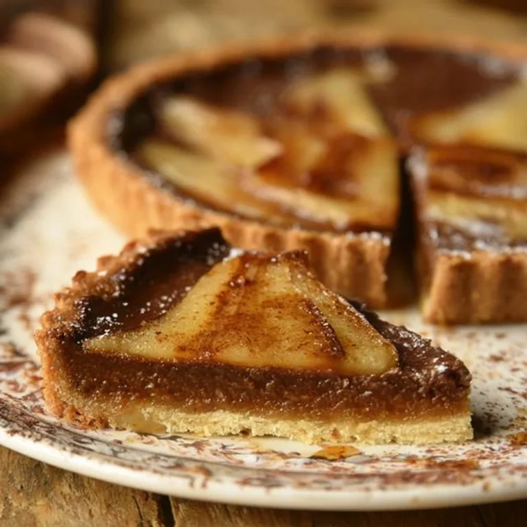 Tarte Poire Chocolat garnie de poires et de chocolat fondant