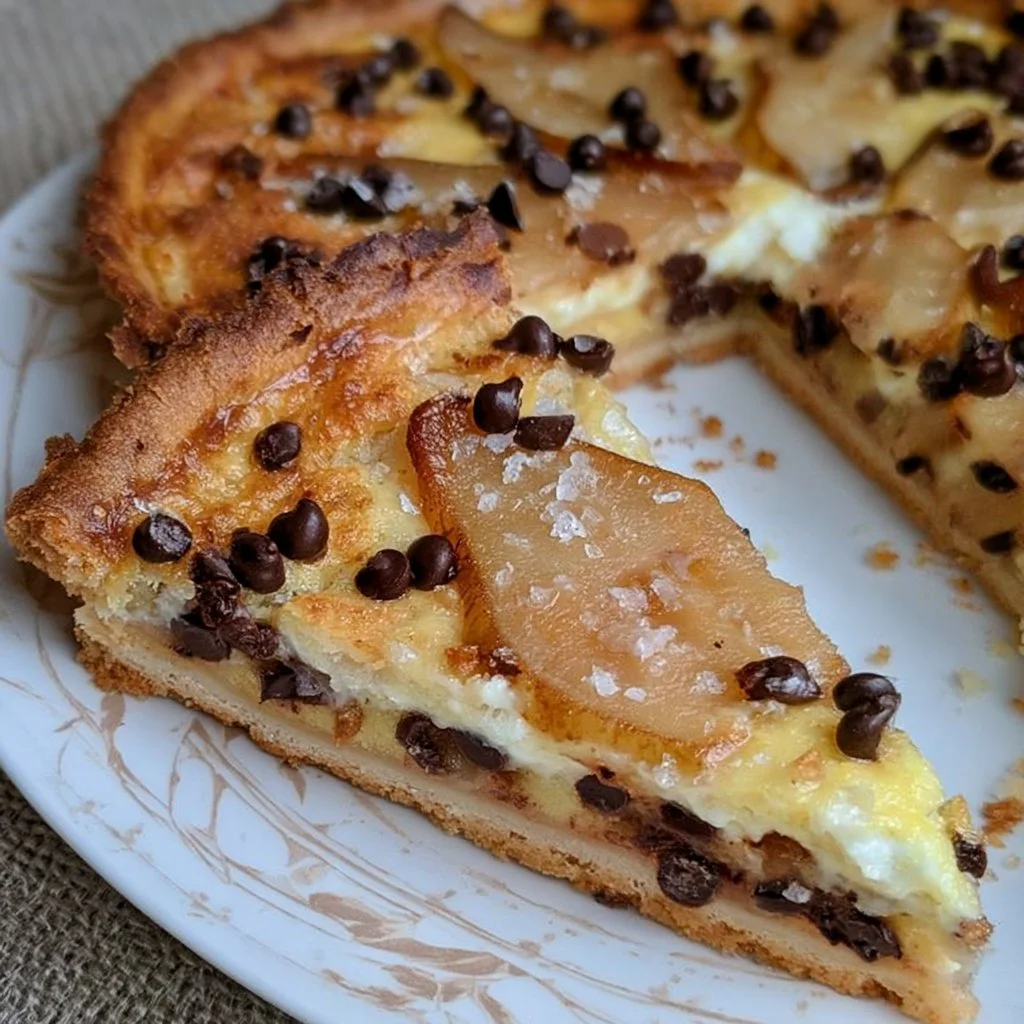 Tarte poire chocolat facilement préparée avec des poires et pépites de chocolat